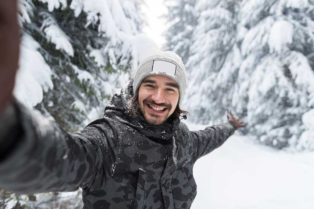 young man smile camera taking selfie photo in wint small